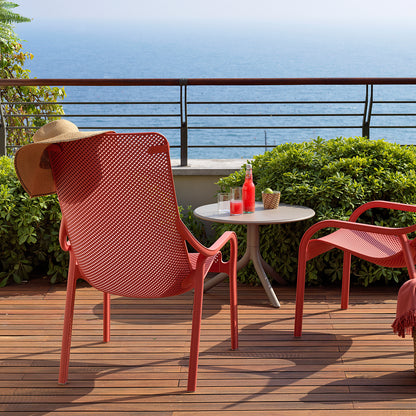 Stylish garden furniture set featuring two Net Lounge Chairs