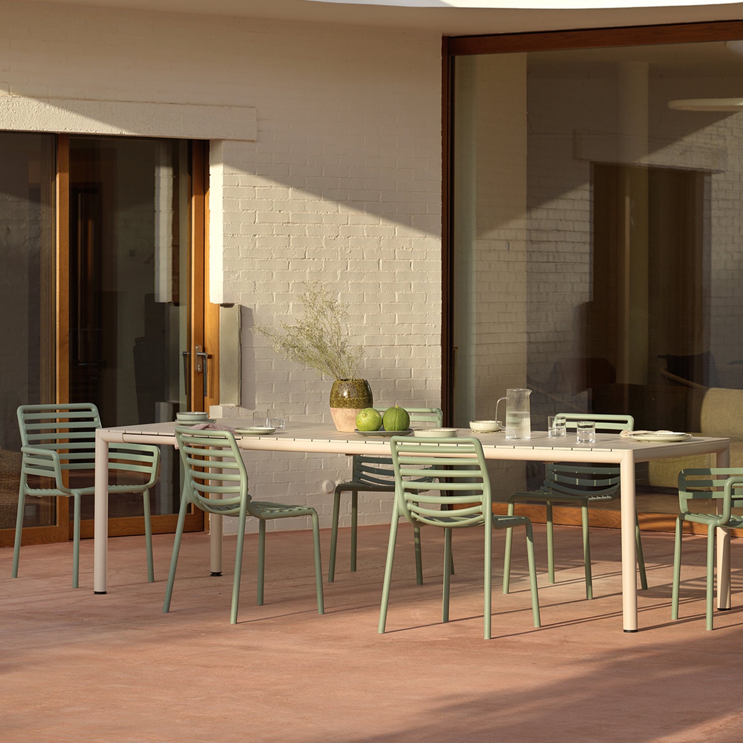 Tevere 210 garden table looks inviting with mix and match doga bistro and armchairs. Complete the look with matching cushions available seperately. 