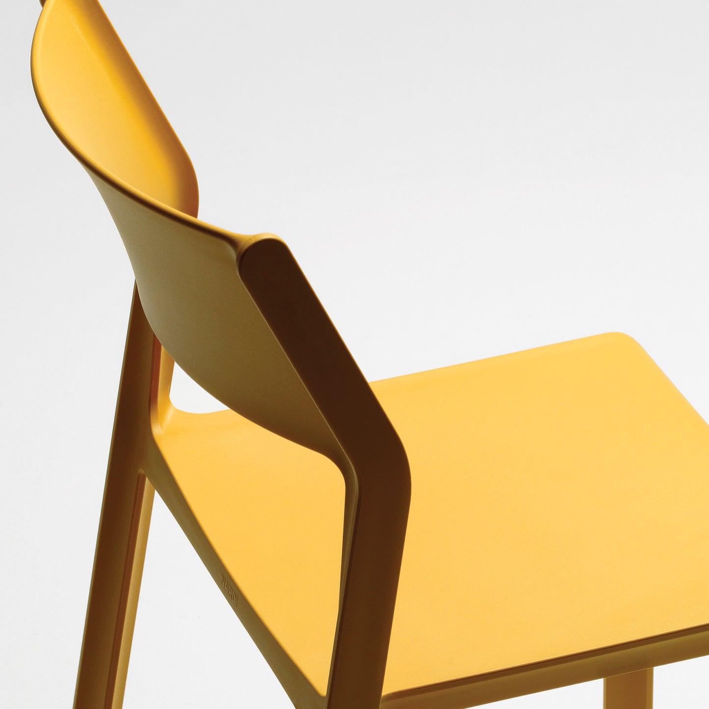 Brighten up your garden with the mustard finish Trill bistro chair from Nardi Outdoor.